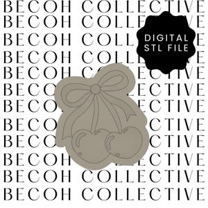 Puede incluir: Un archivo STL digital para un cortador de galletas impreso en 3D con forma de dos cerezas con un lazo en la parte superior.