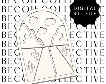 May include: A digital STL file featuring a desert landscape design. The design includes a road, mountains, clouds, and cacti, all within a rectangular frame. The text "DIGITAL STL FILE" is on a black shape. The background has the text "BECOH COLLECTIVE".