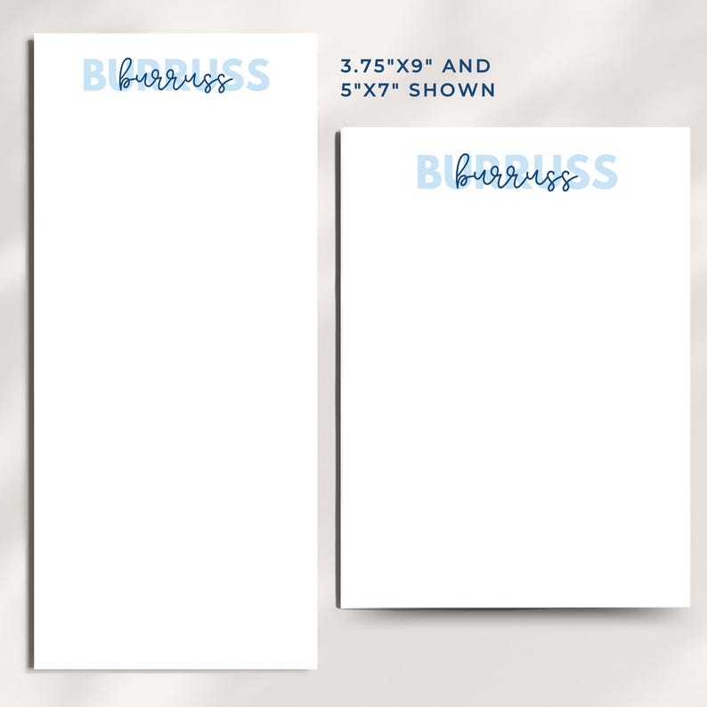 May include: Two white notepads with the word "burruss" in blue script. The larger notepad is 9.5cm x 22.9cm and the smaller one is 12.7cm x 17.8cm. The text "3.75"X9" AND 5"X7" SHOWN" is also visible.
