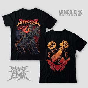 May include: A black short-sleeve t-shirt featuring a front graphic of a fire-breathing armored character with the text "SNAKE EDGE" and a back graphic of two crossed armored fists with the letters "S" and "E" and the text "ARMOR KING FRONT & BACK PRINT".