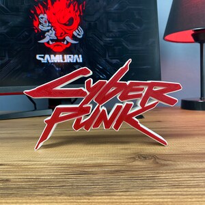 Cyberpunk Red Logo Sign Figure – High-Quality 3D Printed Game Decor for Futuristic Enthusiasts