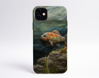 May include: A phone case with a colorful fish swimming in a blue and green water scene. The fish is orange, yellow, and green. The background is a textured, blue and green fabric.