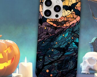 May include: A black iPhone case with a stained glass design featuring bats and a moon. The design is in shades of blue, purple, and yellow.