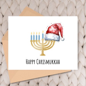 Biglietto di Chrismukkah, biglietto interreligioso che celebra Hanukkah e Natale con una menorah e un cappello di Babbo Natale