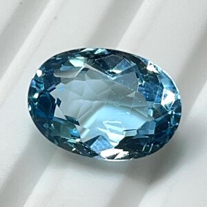 Sky Blue Topaz Quartz, Oval Faceted Jewelry Gem (14x10x7 mm)