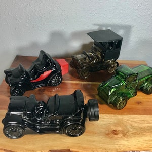 Avon Cologne Decanter 1970-80’s Black T Touring Car Green Big Mack Truck Electric Charger REO Depot Wagon Perfume Reusable Vintage Collector