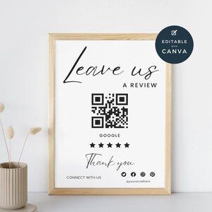 Puede incluir: Un cartel blanco con texto negro que dice "Leave us a review". Debajo del texto hay un código QR en blanco y negro, seguido de la palabra "Google" y cinco estrellas negras. El texto "Thank you" está debajo de las estrellas. El texto "Connect with us" está debajo del mensaje de agradecimiento, seguido de iconos de redes sociales y el texto "@yoursocialhere".