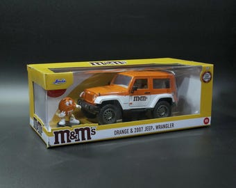 2007 Jeep Wrangler Oranger M&M 1/24 Diecast Model Car by Jada 34401