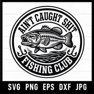 May include: Black and white graphic design featuring a fish with the text "Ain't Caught Shit Fishing Club" in a circular design. Two hooks are on either side of the fish. The bottom of the image has the text "SVG PNG EPS DXF JPG".