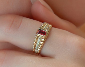 14 kt gouden robijnrode ring, diamantaccenten, band met kralen