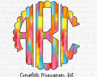 May include: A colorful monogram design with the letters A, B, and C in a circle with a scalloped edge. The letters are in a rainbow of colors, including red, orange, yellow, green, blue, and purple. The text "Complete Monogram Set" is below the monogram.