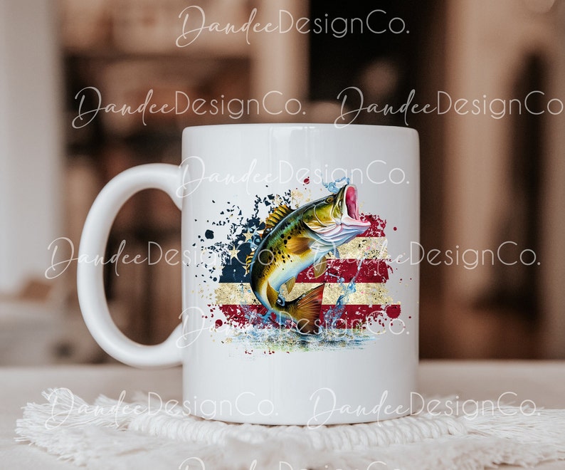 May include: White ceramic mug featuring a graphic of a bass leaping from the water in front of a distressed American flag design.