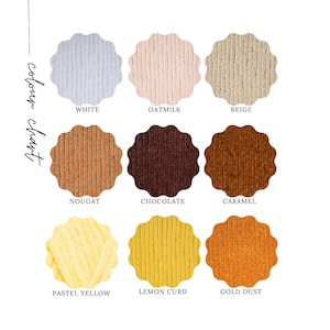 May include: Color chart showing nine different shades of fabric. The colors are white, oat milk, beige, nougat, chocolate, caramel, pastel yellow, lemon curd, and gold dust.