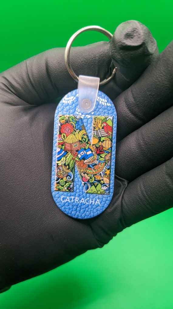 Carry a piece of Honduras with you with this cute Catrachos keychain - Show off your Honduran pride with this vibrant Honduras keychain