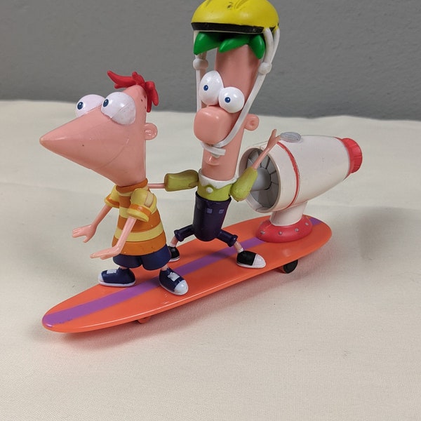 Phineas and Ferb action figures with jet power skateboard. Collector Vintage Toys.