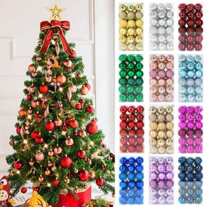 May include: A decorated Christmas tree with red, gold, and silver ornaments. The tree is surrounded by boxes of various colored ornaments, including gold, silver, red, pink, blue, green, and white.