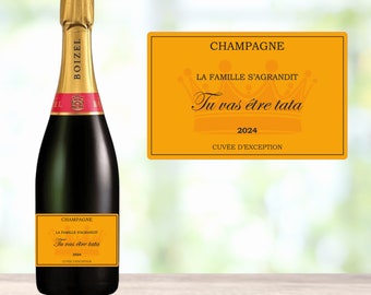 Je wordt tante Champagne-label dat de zwangerschap aankondigt