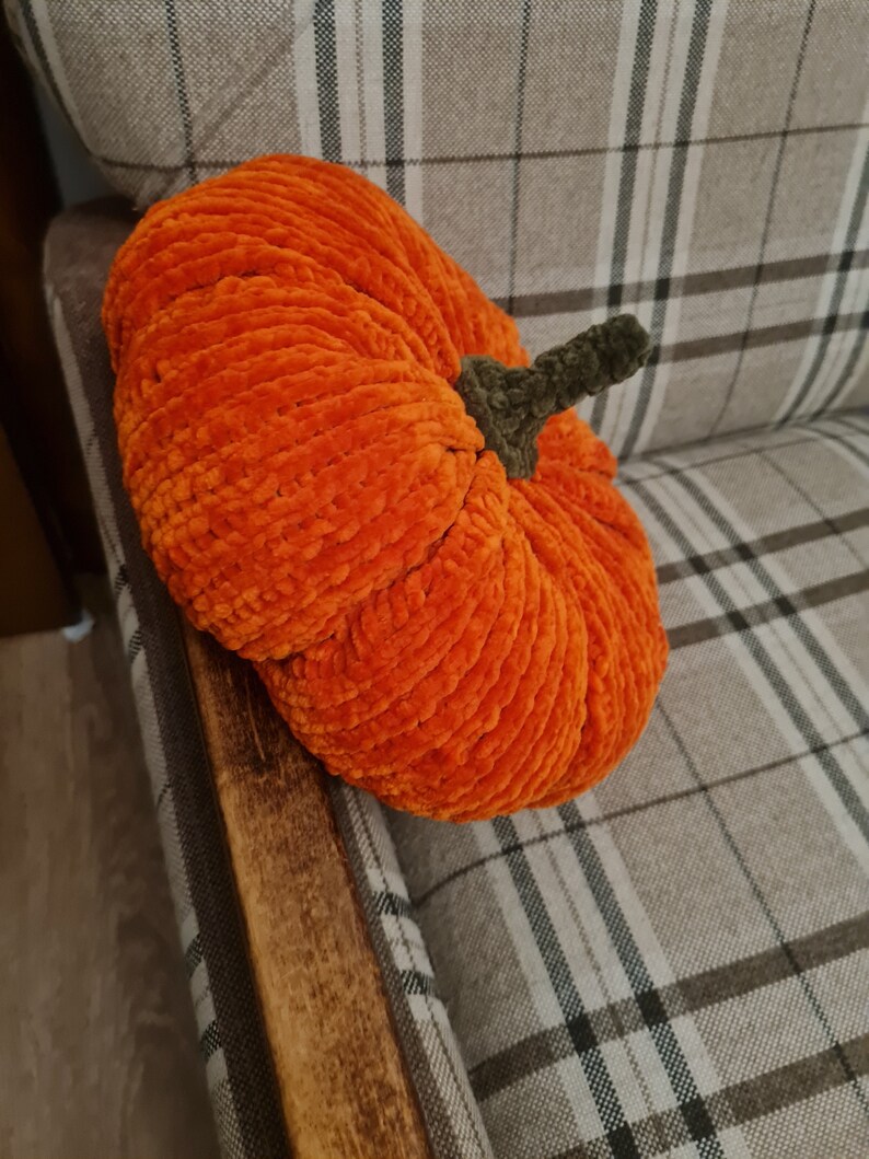 pumpkin cushion on the chair