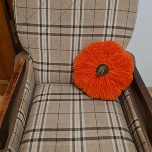 pumpkin cushion on the chair