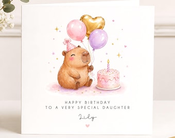 May include: A square greeting card featuring a watercolor illustration of a brown capybara wearing a pink polka-dot party hat, holding three balloons and sitting next to a pink birthday cake. Text reads: HAPPY BIRTHDAY TO A VERY SPECIAL DAUGHTER Lily.