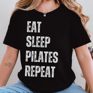 PILATES SHIRT Gift for Pilates Lover Funny Gym Shirt Pilates Workout Tee Exercise Shirt Present Pilates Instructor Eat Sleep Pilates Repeat