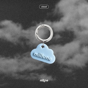 May include: A light blue cloud-shaped keychain with the word "millune" in white lettering. The keychain is attached to a silver metal ring. The word "cloud" is above the keychain. The background is a grayscale image of clouds.