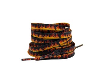 May include: Black shoelaces with a yellow and orange flame pattern.