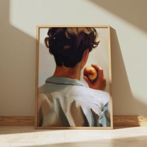 May include: A painting of a person with brown hair, wearing a light blue shirt, holding a yellow apple in their hand. The person is facing away from the viewer.