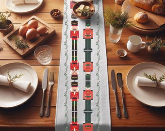 May include: White table runner with a repeating pattern of nutcracker soldiers in red, green, and black. The nutcrackers are holding a sword and have a mustache. The pattern is bordered by green leaves.