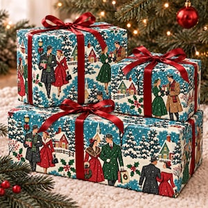 May include: Three rectangular gift boxes wrapped in teal paper featuring a vintage winter village scene with people in coats, tied with dark red satin ribbons. The pattern displays snow-covered houses, evergreen trees, and figures in festive attire.