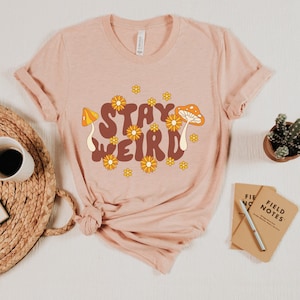 Stay Weird Flowers and Mushroom Unisex Jersey Short Sleeve Tee