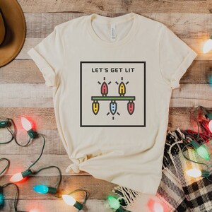 Let&#39;s Get Lit Unisex Jersey Short Sleeve Tee