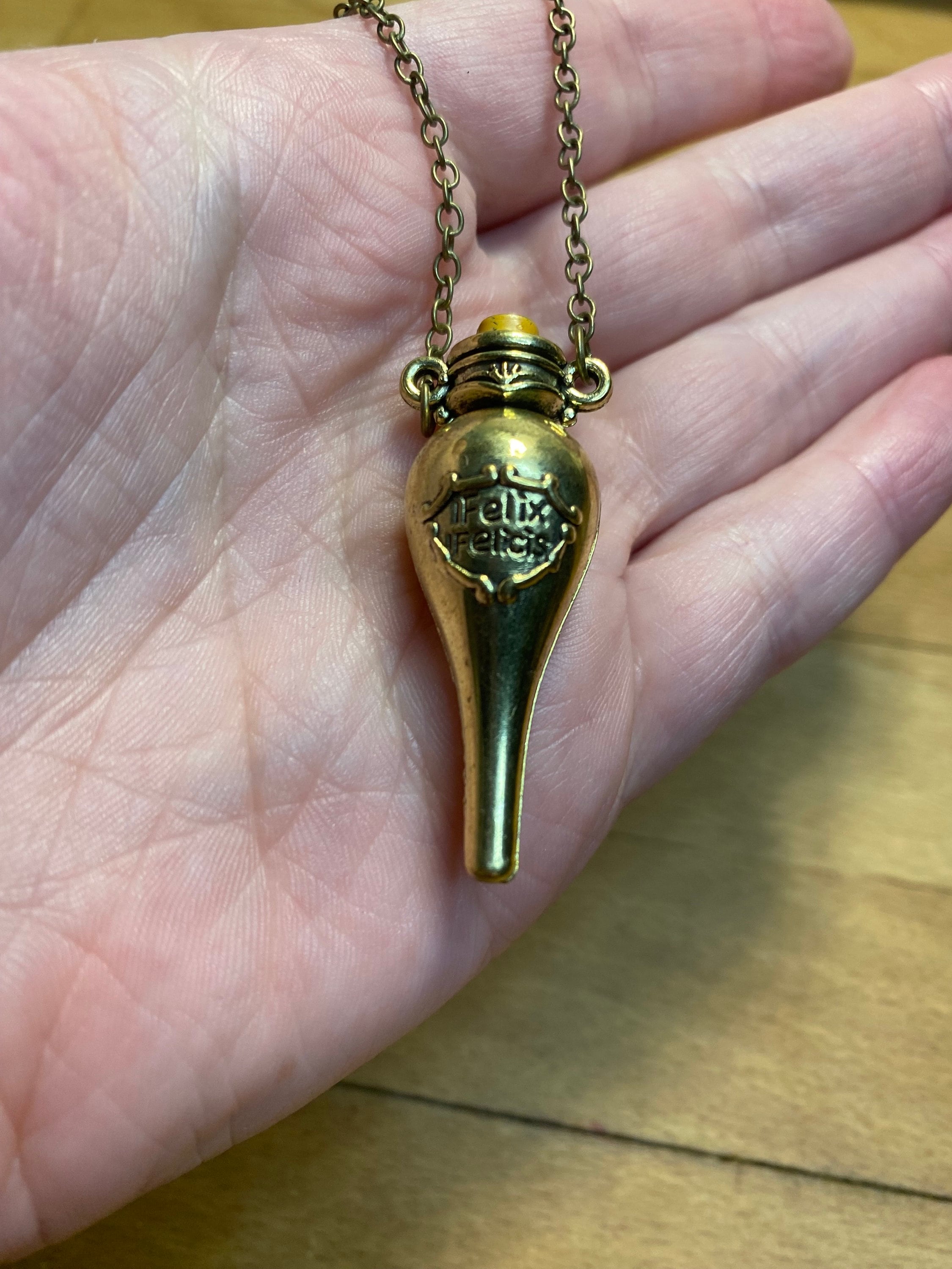 Harry potter felix felicis necklace deals