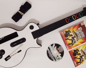 Nintendo Wii Guitar Hero Controller with Strap Gibson Les Paul Guitar Hero World Tour Game Bundle