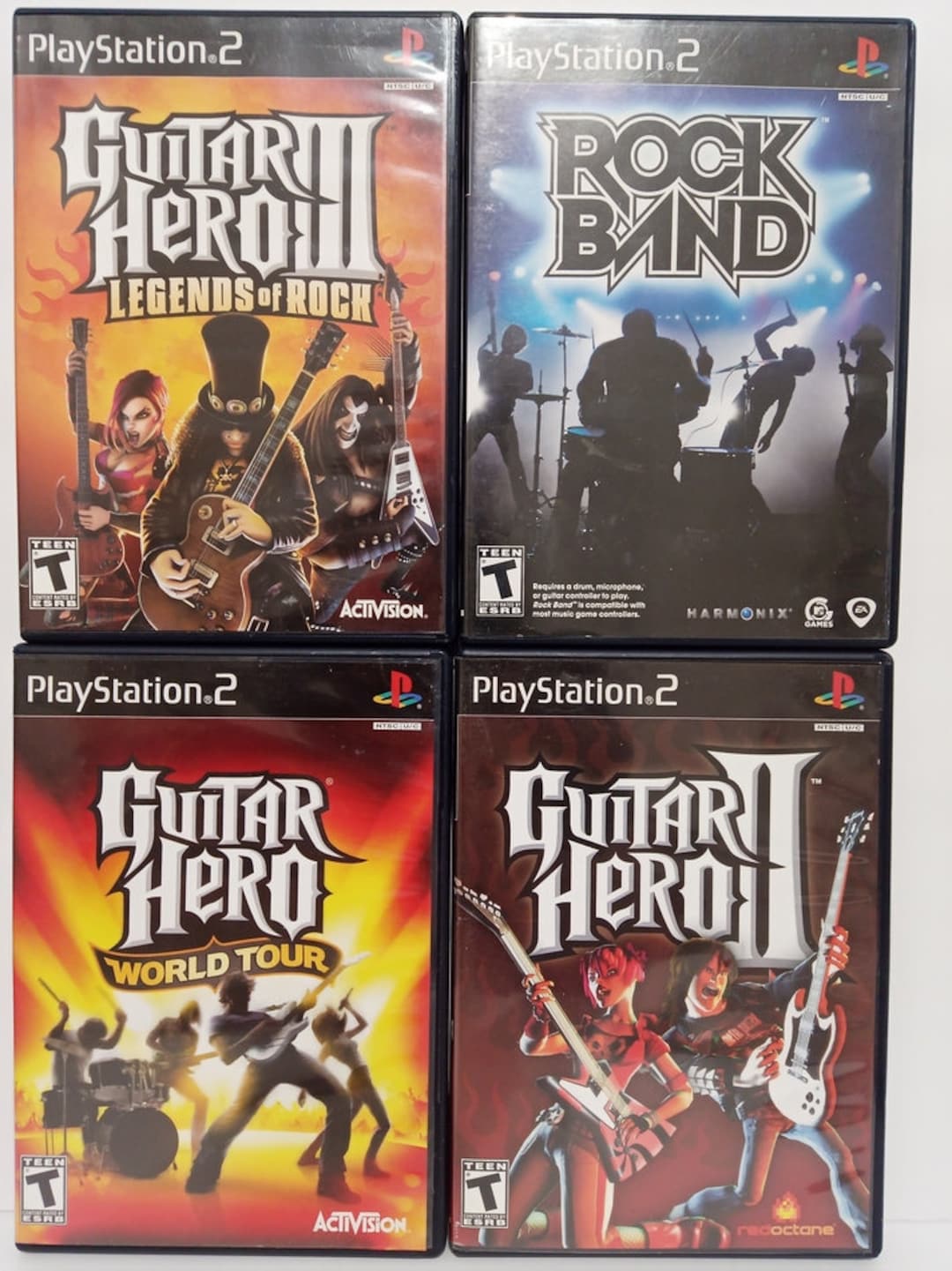 Lot of 4 PS2 PlayStation 2 Games Rock Band Guitar Hero II and III Dance Rev  EX 2