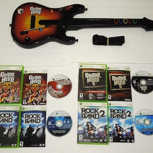 Xbox 360 Guitar Hero Sunburst Controller Bundle With 4 Games & Strap Guitar Hero 5