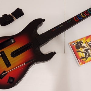 Nintendo Wii Guitar Hero Controller with Strap Sunburst Guitar Hero World Tour Game Bundle