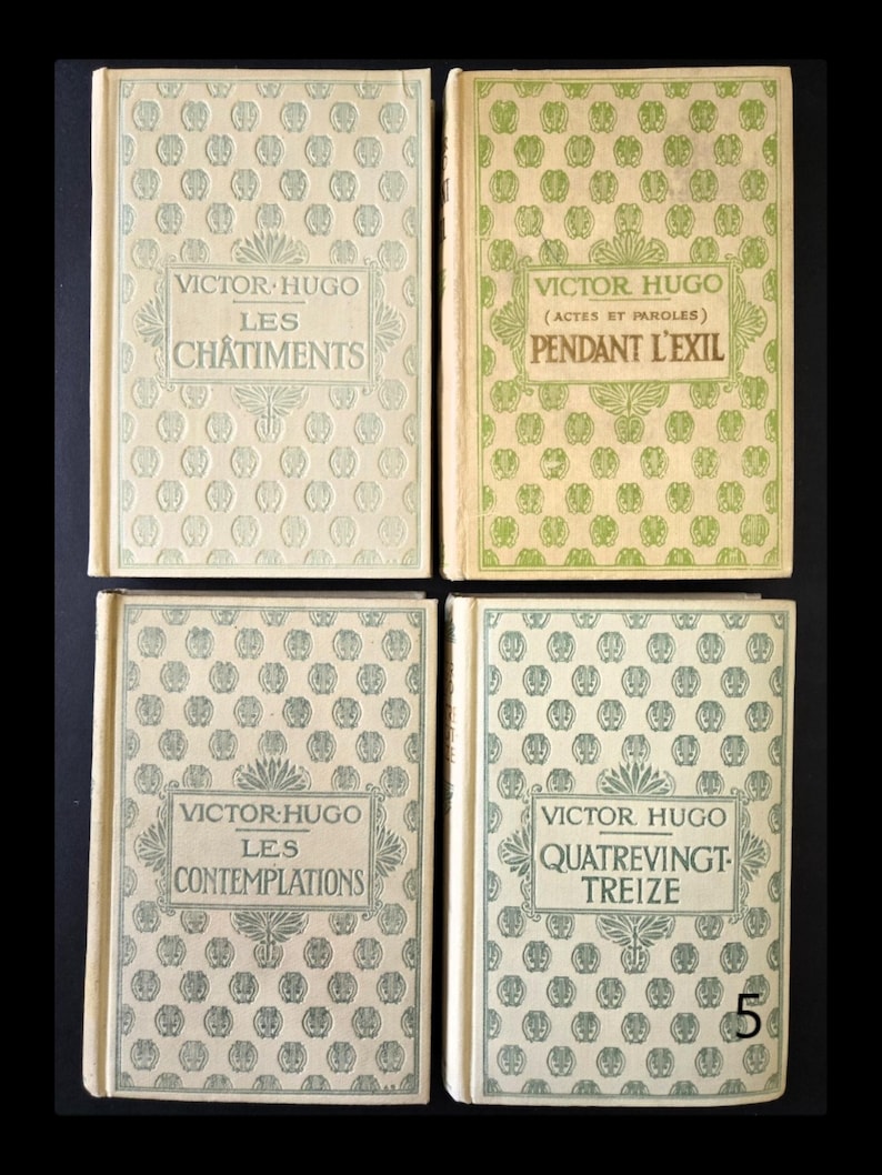 May include: Four vintage books by Victor Hugo are shown. The book covers have repeating patterns and titles in elegant fonts. The titles include "Les Ch&acirc;timents", "Pendant L'Exil", "Les Contemplations", and "Quatrevingt-Treize". The books are in shades of green and cream.
