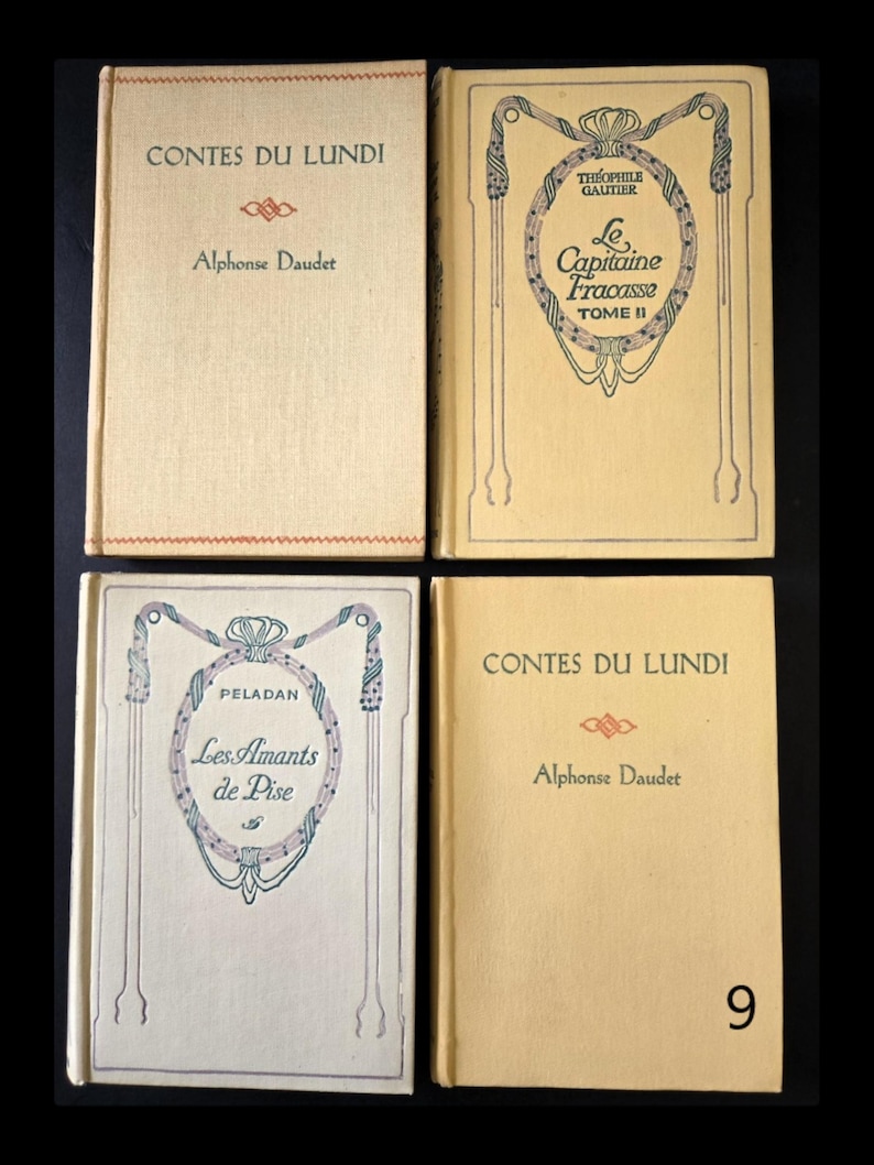 May include: Four vintage books with cream covers are shown. The titles and authors are printed in black and red. The books include "Contes du Lundi" by Alphonse Daudet, "Le Capitaine Fracasse Tome II" by Th&eacute;ophile Gautier, and "Les Amants de Pise" by Peladan.