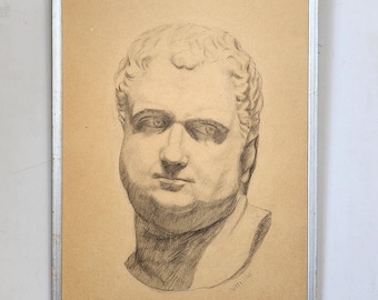 May include: A framed pencil drawing of a bust of a man with curly hair and a strong jawline. The artwork is on tan paper and is signed in the lower right corner. The frame is silver.