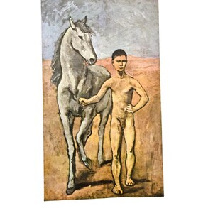May include: A painting depicting a nude youth standing beside a grey horse in a desert landscape. The figure has one hand resting on the horse's shoulder and the other on their hip. The background features a muted sky and sandy ground.