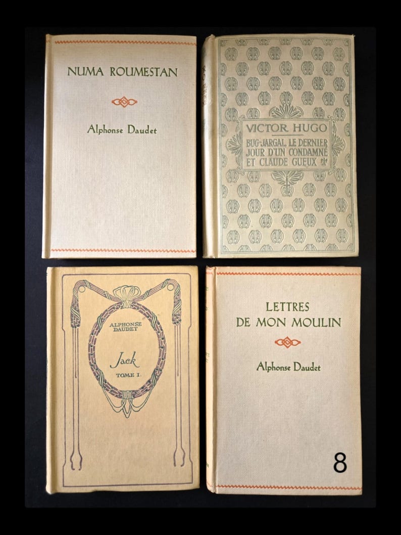 May include: Four vintage books with cream covers are shown. The titles and authors are visible, including "NUMA ROUMESTAN" by Alphonse Daudet, and "BUG-JARGAL, LE DERNIER JOUR D'UN CONDAMN&Eacute; ET CLAUDE GUEUX" by Victor Hugo.