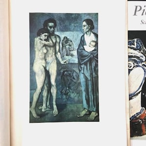 May include: A book page featuring a blue-toned painting of a group of figures, including a couple embracing, a person holding an infant, and two seated figures in the background. The text Pi is visible on the adjacent page edge.