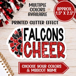 May include: A die-cut sticker featuring a red and black cheerleading pom-pom graphic next to the text FALCONS CHEER in bold lettering. The design includes a printed glitter effect and measures approximately 1.5 inches by 2.5 inches.