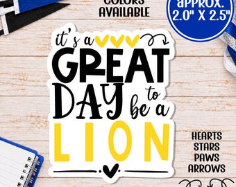 May include: A white die-cut sticker featuring the black and yellow text 'it's a GREAT DAY to be a LION' with three yellow hearts above the word 'GREAT'. The sticker measures approximately 2.0 inches by 2.5 inches and includes various icon options.