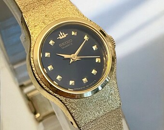 Seiko SII Raphael Cherub Gold Watch - Etsy Canada display picture 2