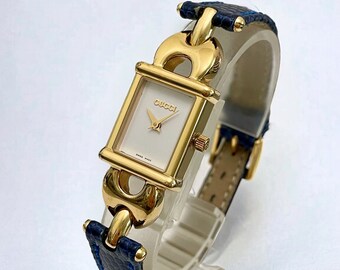 Vintage Gucci Watch 1800 L Gold Plated Wristwatch with Navy Blue Leather Strap