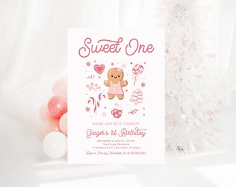 May include: A pink and white invitation card with the text "Sweet One" and "Ginger's 1st Birthday". The card features a gingerbread girl illustration with candy canes, a lollipop, a heart, and a cup of hot chocolate.