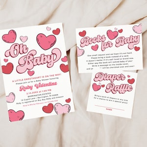 May include: A pink and red baby shower invitation with the text "Oh Baby" in a retro font. The invitation includes details for a baby shower for Ruby Valentine, including the date, time, and location. There are also two smaller cards, one for a book request and one for a diaper raffle.