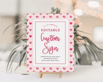 May include: Editable custom sign with a pink background and a border of pink watercolor hearts. The sign is 5 inches by 10 inches and is vertical. The text on the sign reads "Editable Custom Sign" and "Personalize and print unlimited signs with your own text!"